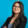 Photo of team member Michelle Arroyo smiling and posing for a photo