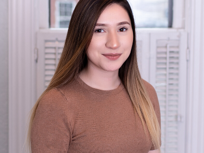 Staff member Samantha Martinez posing for a photo