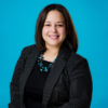 Photo of team member Yesy Garcia smiling for photo