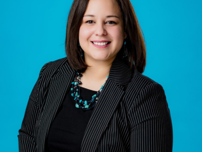 Photo of team member Yesy Garcia smiling for photo