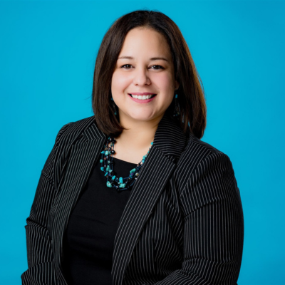 Photo of team member Yesy Garcia smiling for photo